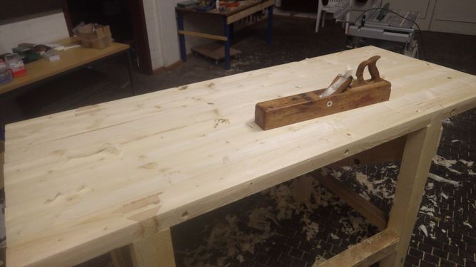 a jointer plane is the proper tool for planing such a large surface