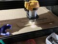 Cutting a fixture to reliably route multiple of the same piece on the CNC.